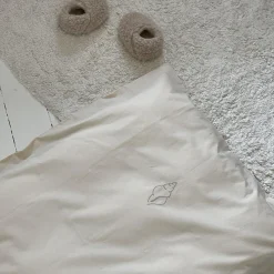 Best We Are Bitte Baby sengetøj, konkylie oat med konkylie