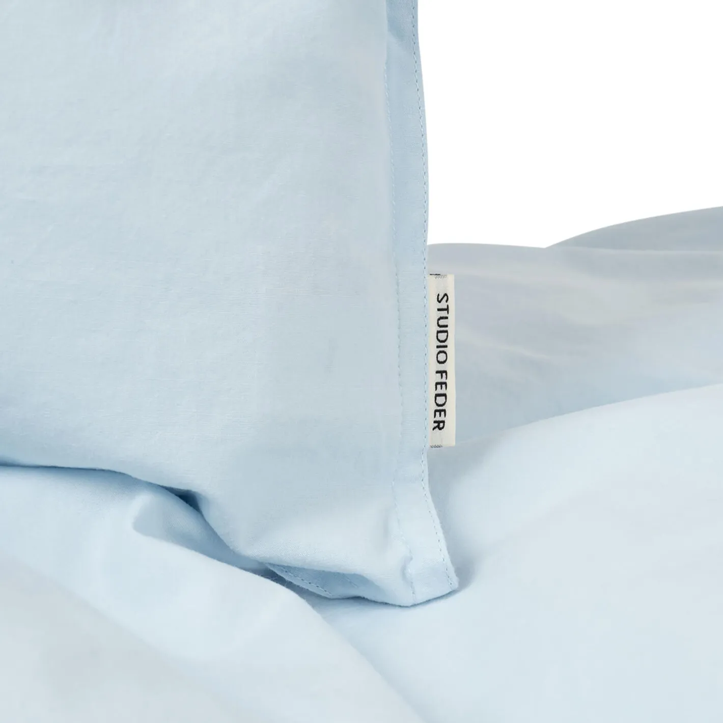 New Studio Feder Junior sengetøj, light blue